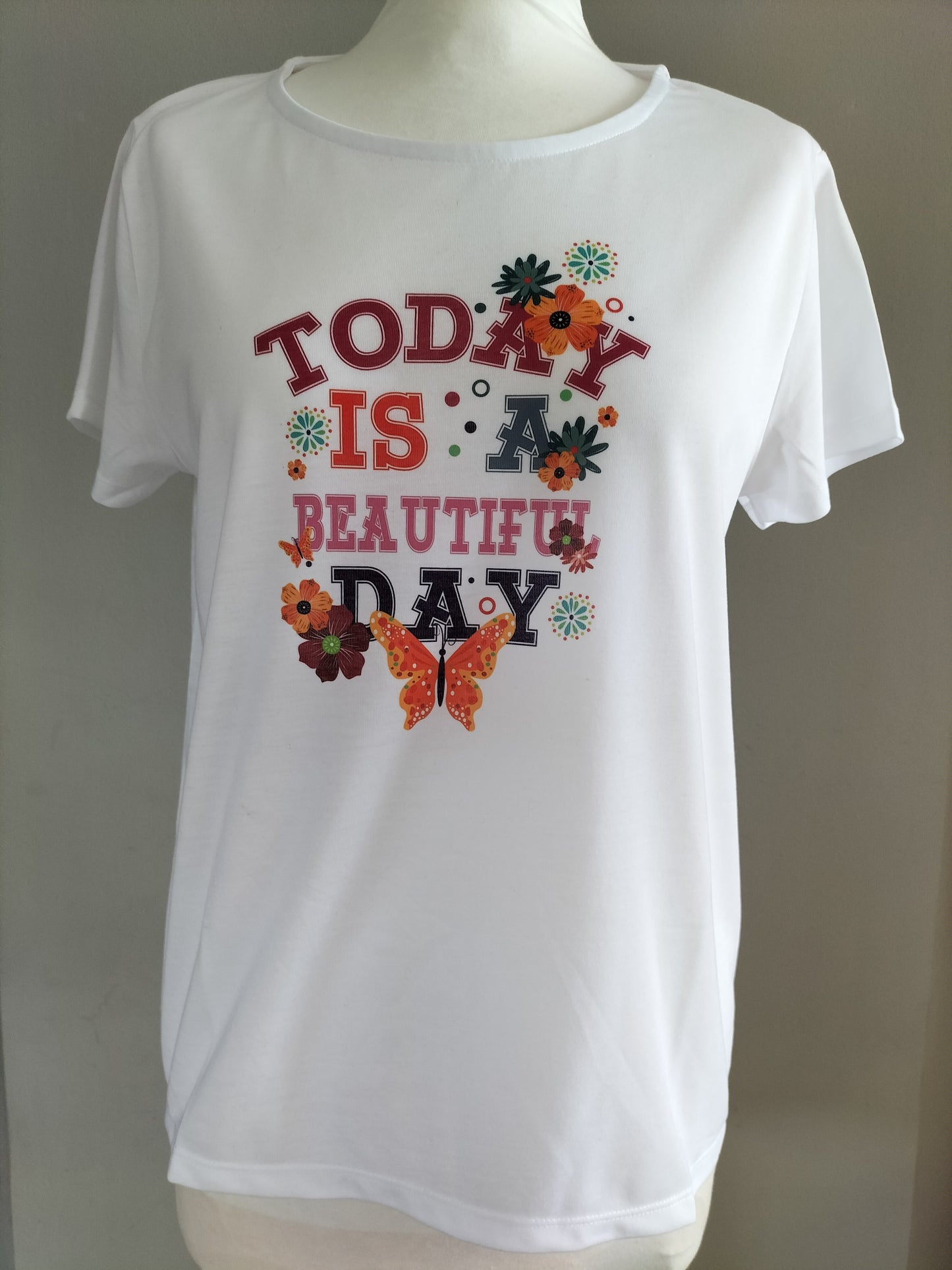 Beautiful women's T-short 65% polyester and 35% cotton with stunning  text design Crafted